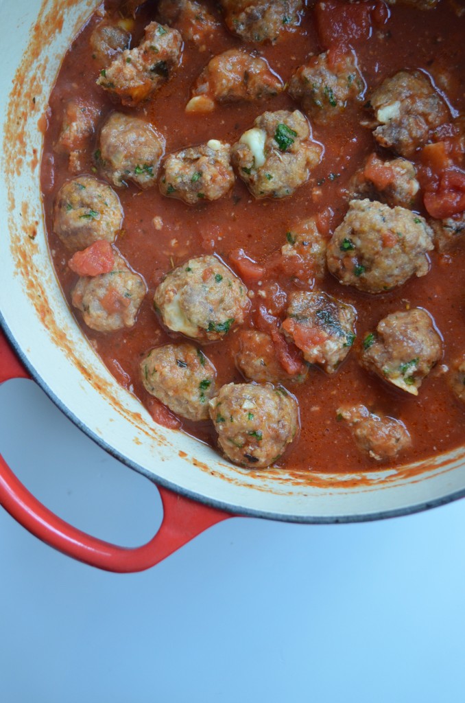 Spicy Smoked Mozzarella Stuffed Meatballs with Tomato Sauce From Scratch with Maria Provenzano Click for recipe!